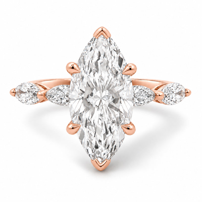 14K rose gold marquise diamond engagement ring featuring a 2.50 carat marquise-cut lab grown center diamond, four marquise side stones, and distinctive tab and claw prongs