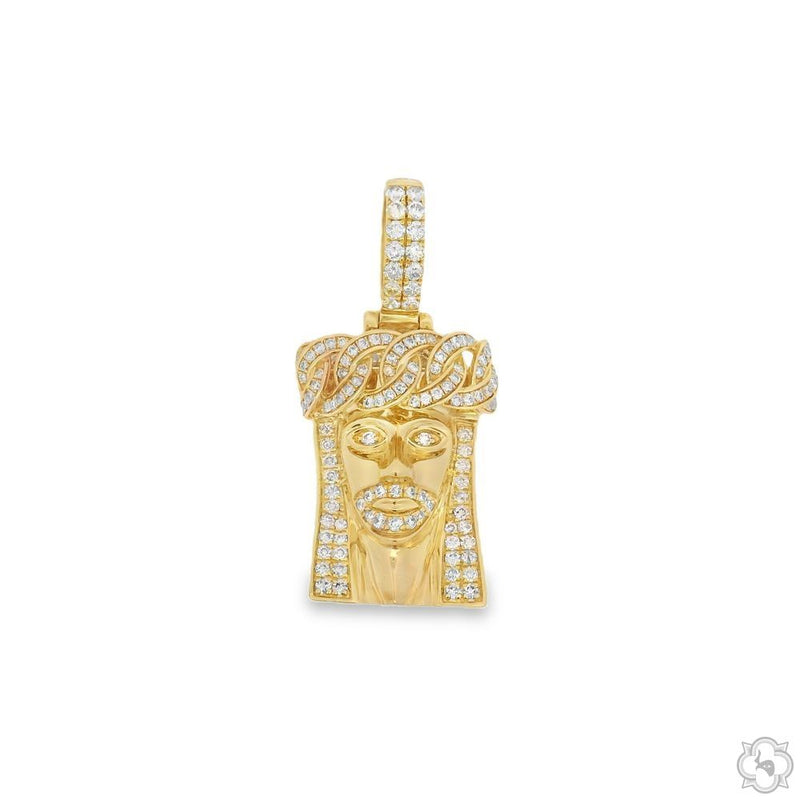 14k yellow gold Jesus pendant with crown detail and diamond accents on bail and face.
