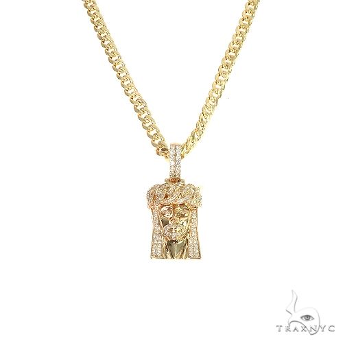 14k yellow gold Cuban link chain with diamond-studded crown Jesus pendant set.