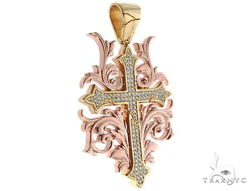 14k two-tone gold cross pendant with diamond filigree detailing and rose gold accents