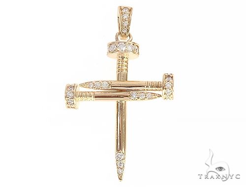 14k yellow gold cross pendant shaped like nails with diamond accents