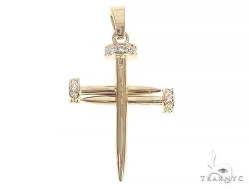 14k yellow gold cross pendant shaped like nails with diamond accents.