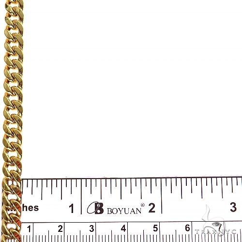 14k yellow gold hollow Miami Cuban link chain 6.6mm wide, 24 inches long.