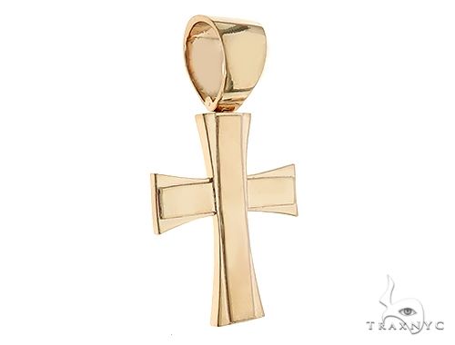 14k yellow gold cross pendant with polished finish and tapered arms