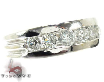 Men's white gold Masterpiece wedding band with seven channel-set round diamonds