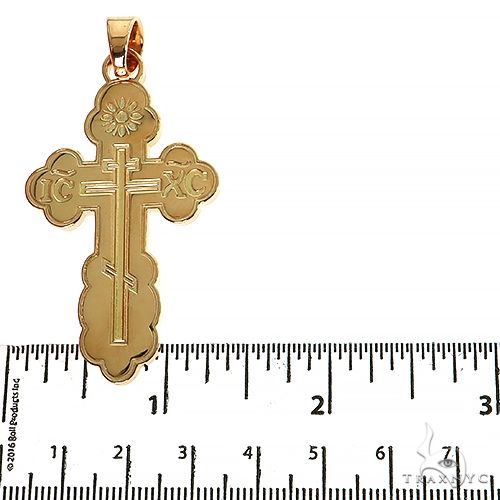18K yellow gold men's cross pendant with intricate design, measuring about 2.5 inches long