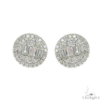 18K white gold diamond cluster earrings with baguette and round-cut stones.