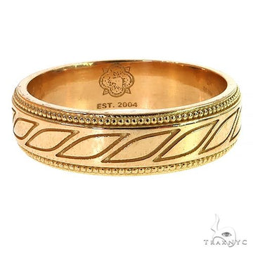18K rose gold men's wedding band with intricate leaf pattern and beaded edges.