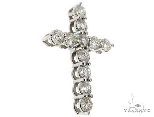 18K yellow gold cross pendant with round brilliant diamonds arranged in a classic design