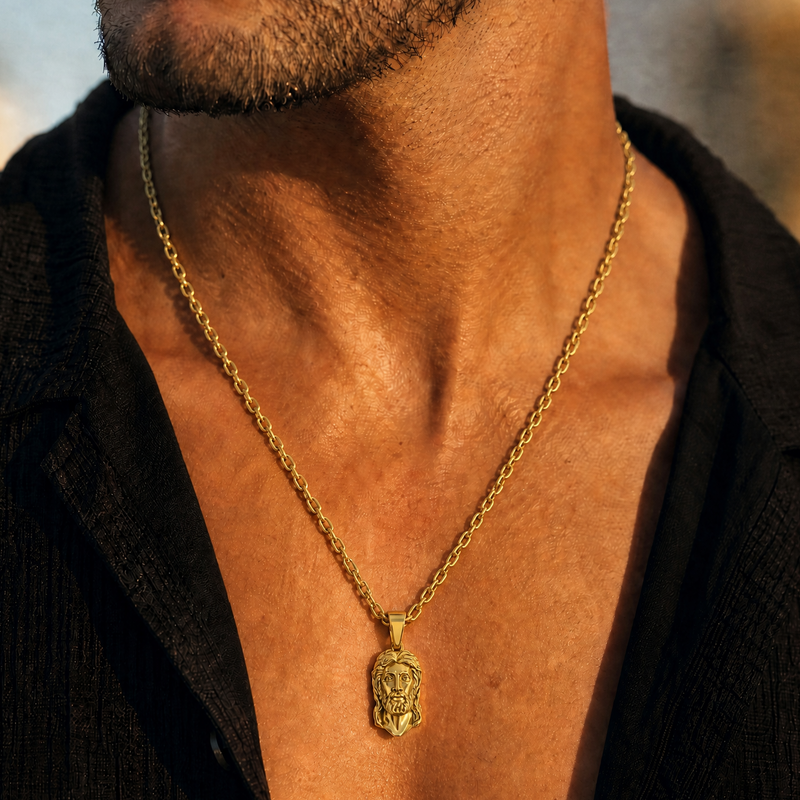 18K green gold Jesus head pendant with sculpted finish on a sterling silver chain