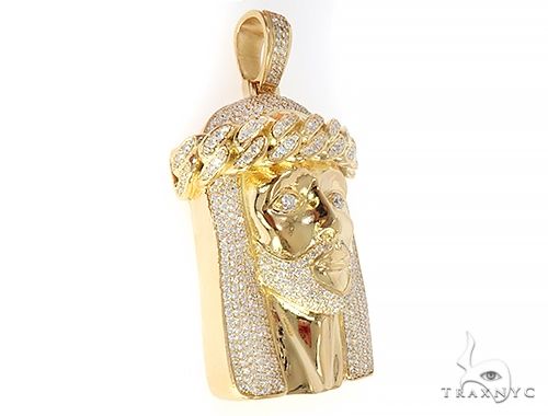 18k yellow gold Jesus pendant with diamond accents and detailed crown of thorns