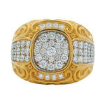 Yellow gold men's ring with diamond filigree and clustered round diamonds centerpiece.