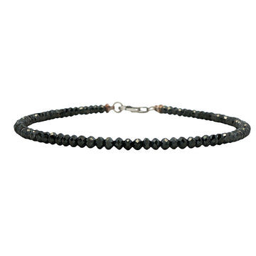 Black diamond bead bracelet with silver clasp, sleek and minimal men's jewelry accessory.