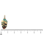 Gold mummified zombie pendant with diamonds and green glow-in-the-dark enamel detailing.