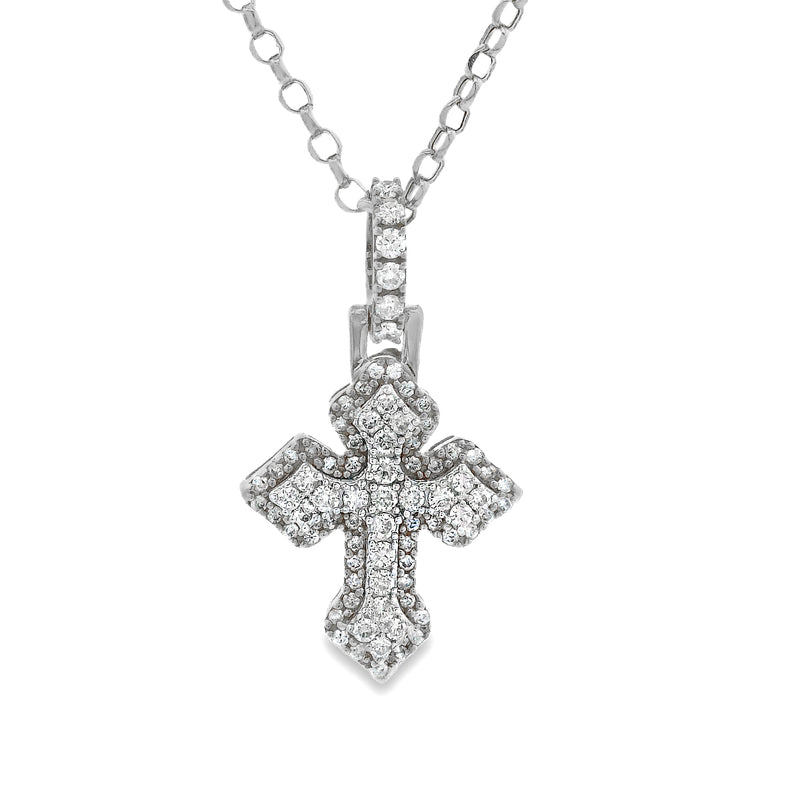 White gold mini cross pendant with sparkling diamond accents on chain.