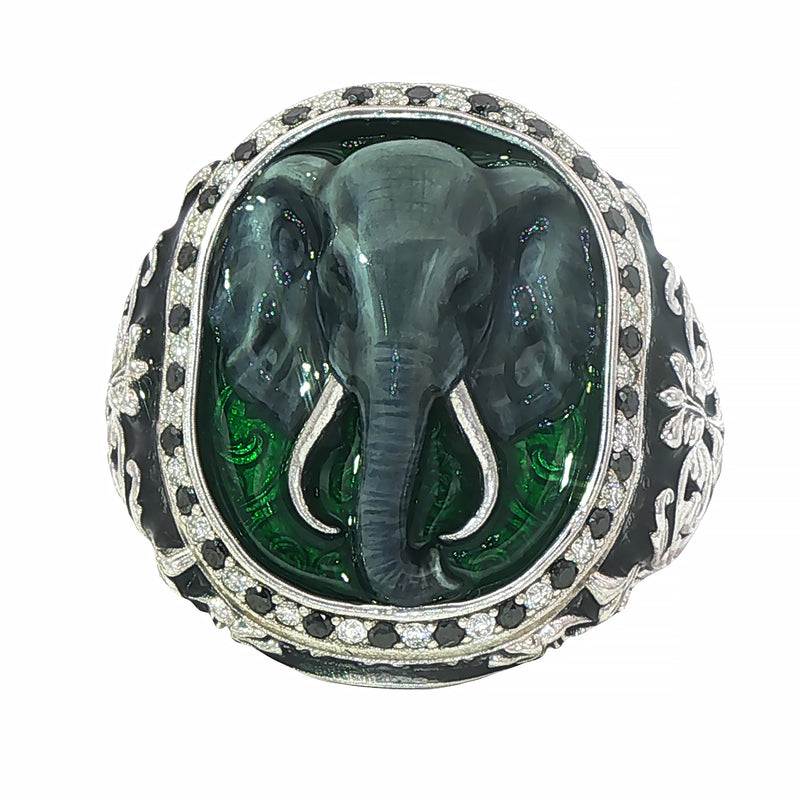 Sterling silver ring with detailed elephant head, black and white diamond accents, green enamel background.