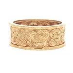 Yellow gold men's band with intricate baroque scrollwork and textured finish.