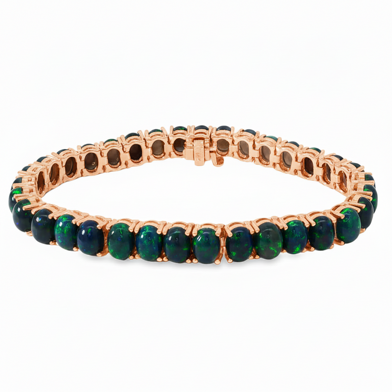 Rose gold tennis bracelet with oval black opal gemstones in a continuous setting.