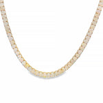 Yellow gold opal chain necklace with square links and subtle gemstone inlays.