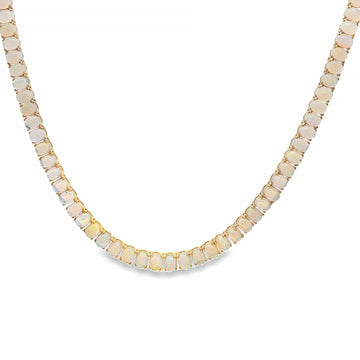 Yellow gold opal chain necklace with square links and subtle gemstone inlays.