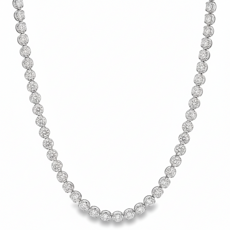 Yellow gold tennis chain necklace with round sparkling diamonds in a classic setting.