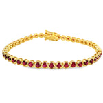 Yellow gold tennis bracelet with round ruby gemstones and secure clasp closure.