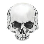 Silver skull ring with antique finish and ornate floral engravings on the band.