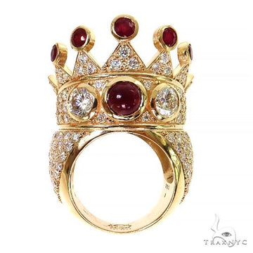Gold crown ring with red ruby and multiple round diamonds, men's custom gemstone design.