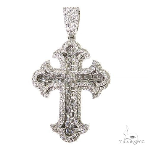 White gold cross pendant with 2 rows of emerald cut diamonds, ornate curved edges