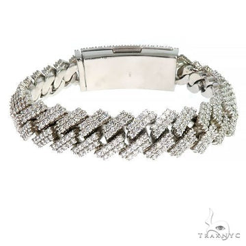 2 row prong set diamond Cuban bracelet – double rows of prong-held diamonds across Cuban links, close-up front angle