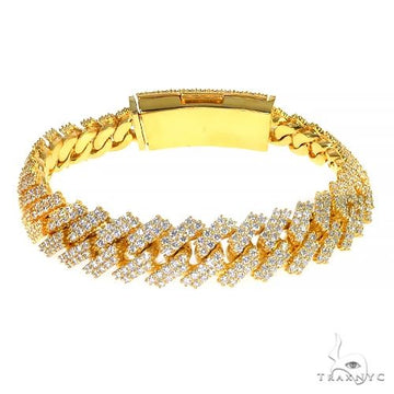 2 row prong set diamond Cuban bracelet in yellow gold – round diamonds in open prong settings across double-row Cuban links