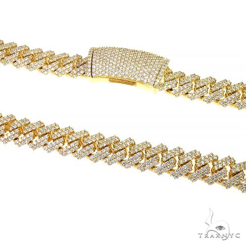 Double row prong set diamond Cuban link chain, close-up showing raised round-cut stones in individual prong settings