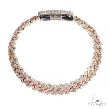 Mens two-tone gold diamond Cuban link bracelet – prong set diamonds across alternating yellow and white gold links