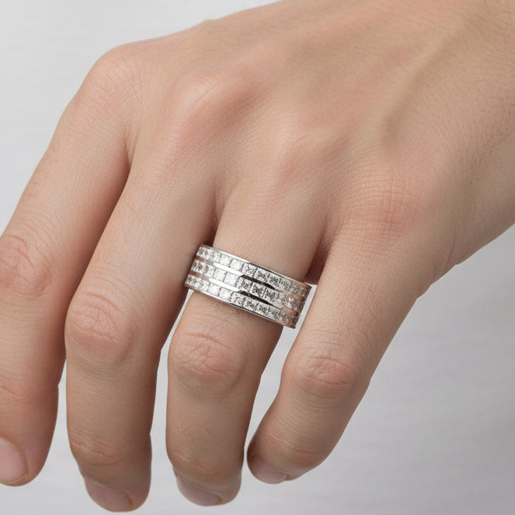 Platinum men's ring with three rows of princess cut diamonds, sleek and polished design.
