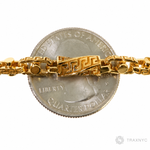26-inch 5.5mm 22K yellow gold Greek key link chain with assorted patterned links.