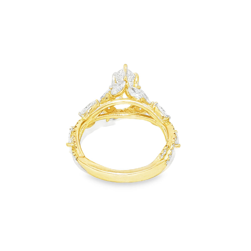 Marquise diamond engagement ring in yellow gold with intricate side diamond accents.