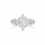 Marquise diamond engagement ring in yellow gold with intricate side diamond accents.
