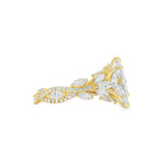 Marquise diamond engagement ring in yellow gold with intricate side diamond accents.