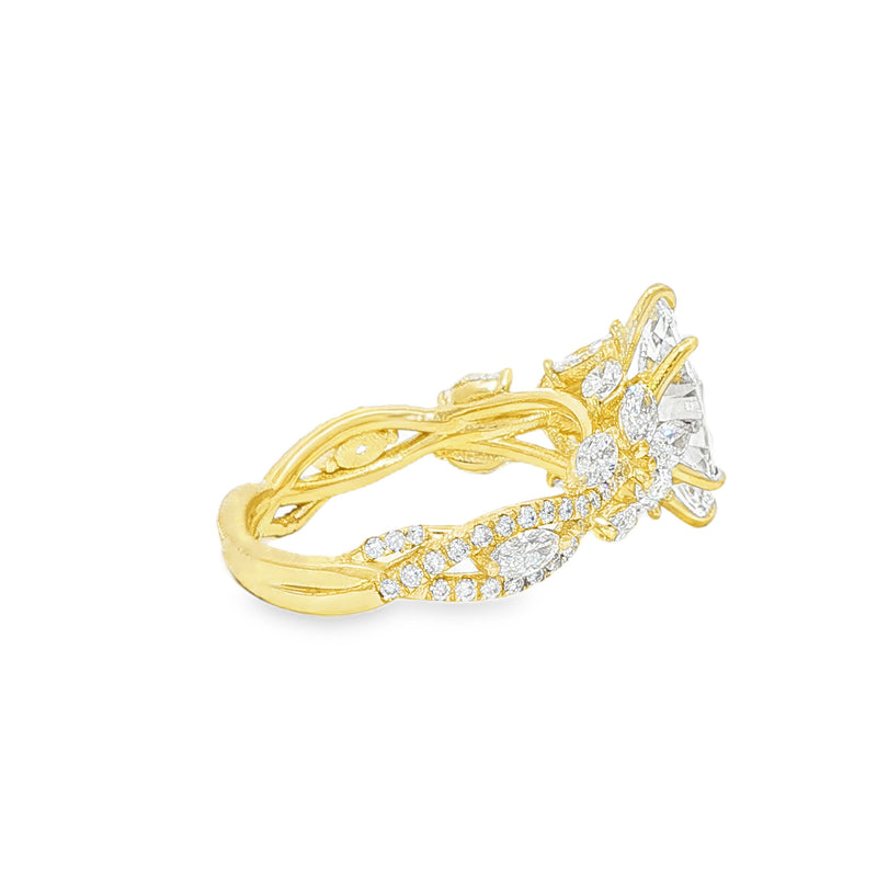 Marquise diamond engagement ring in yellow gold with intricate side diamond accents.