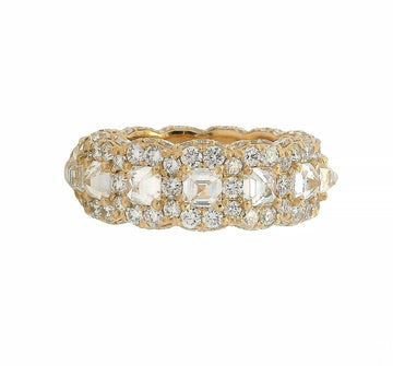 Yellow gold eternity band with upside down Asscher-cut and round diamonds.