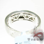 Silver men's wedding band with 8 channel-set round diamonds in a polished finish.