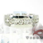 Silver men's wedding band with 8 channel-set round diamonds in a polished finish.