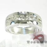 Silver men's wedding band with 8 channel-set round diamonds in a polished finish.