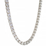 White gold tennis chain with round 75 pointer diamonds, sleek luxury men's jewelry.