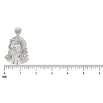 925 silver pendant of Jesus head with detailed hair and crown of thorns, next to ruler for scale.