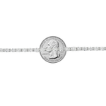 White gold tennis bracelet with oval-cut diamonds in a linked setting.