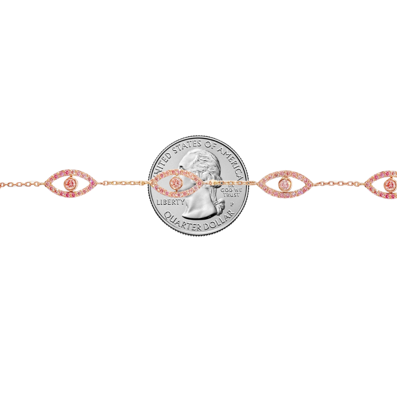 Rose gold evil eye bracelet with pink diamonds and delicate chain links.