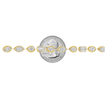 Yellow gold tennis bracelet featuring multi-shape sparkling diamonds in assorted cuts.