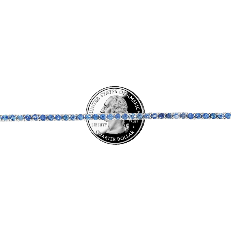 White gold tennis chain necklace with round blue sapphire gemstones, elegant and classic design.