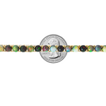 Gold chain necklace with round black opal gemstones evenly spaced around the links.